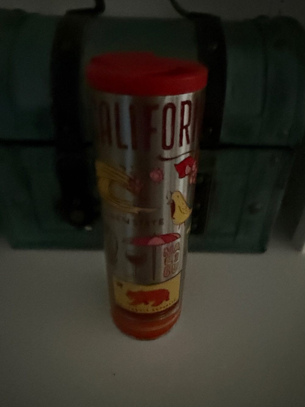 Starbucks Silver Travel Tumbler with Red and yellow Accents